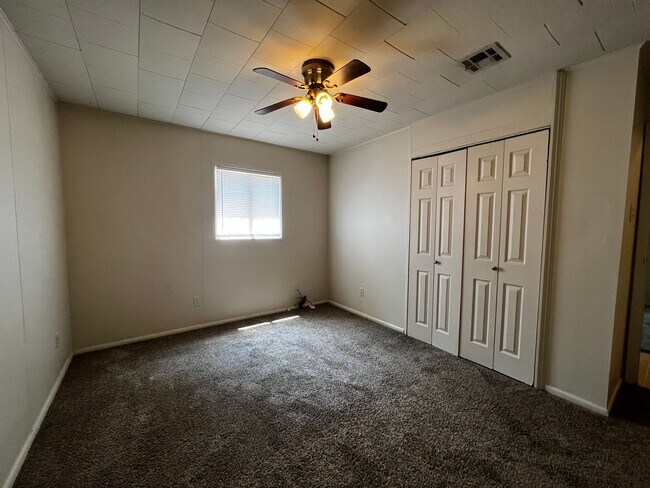 Building Photo - 3 Bedroom, 1.5 Bathroom, Brick Home with yard and Storage Building, Covered Porch