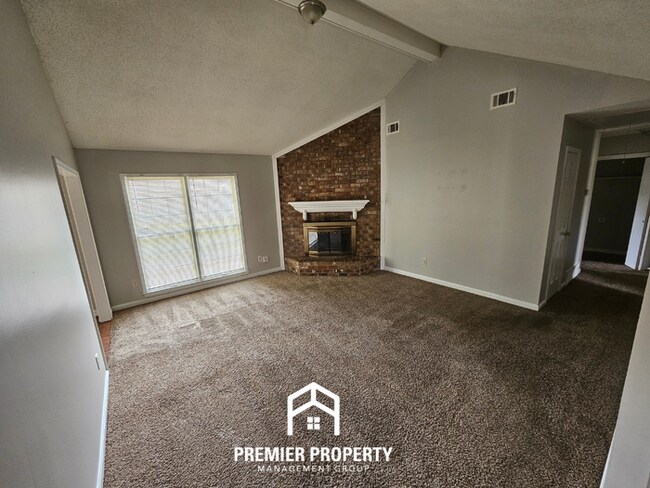 Building Photo - Quiet Cove Living in 38115 | 3BR/2BA with Brick Fireplace & Fenced Yard