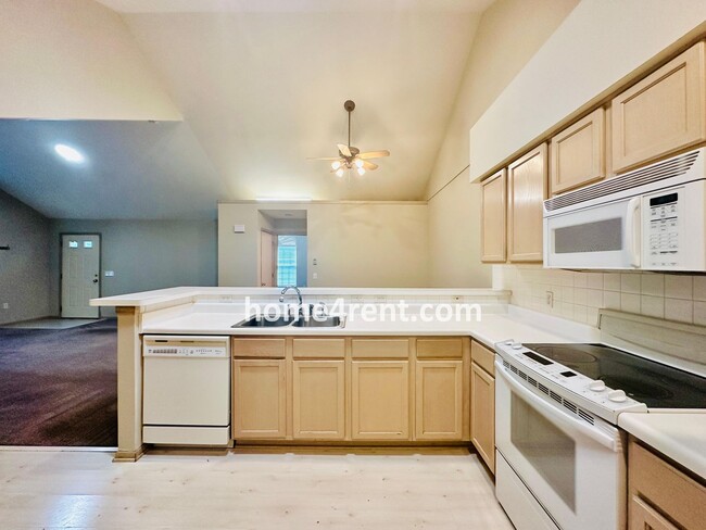 Building Photo - Maintenance FREE, Ranch Style Townhome w/ ...