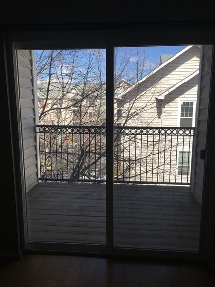 view of balcony from inside the unit - 1591 Spring Gate Dr