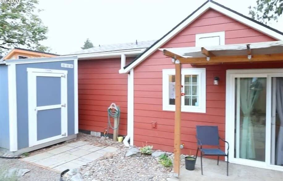 Backyard and shed. Sliding door enters to kitchen. - 251 NW Connell Ave