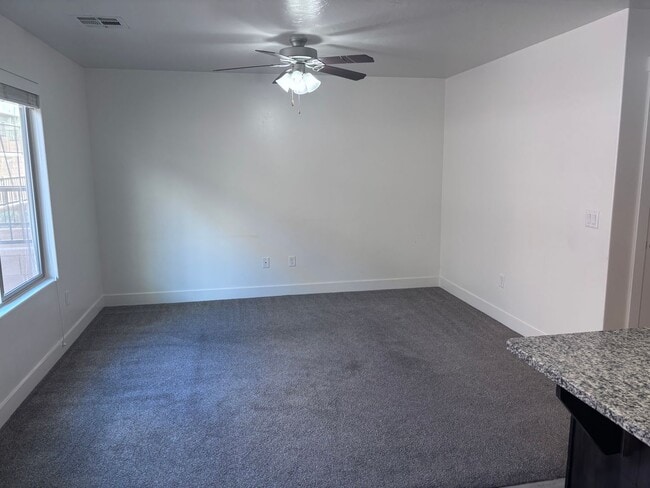 Building Photo - 4bd | 2.5 Bath | 2 Car Detached Desert Canyon Townhome Now Available