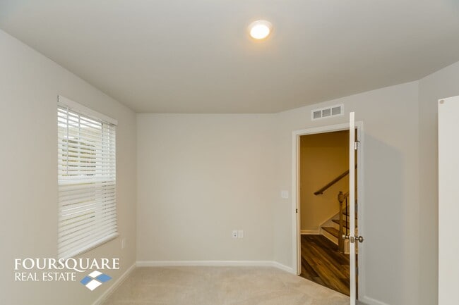 Building Photo - Modern 3-Story Townhome with First-Level B...