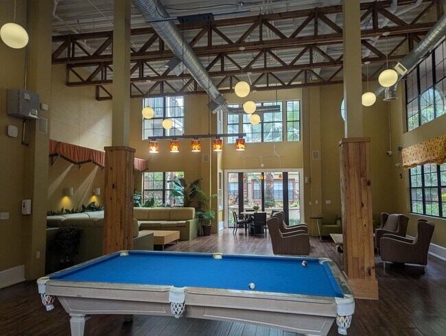 Building Photo - 2x2 Conveniently located. Large open concept, bright and updated: 1075 square feet.