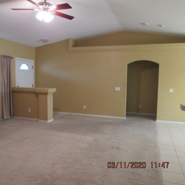 Building Photo - 3 bedroom 2 bath home with 3 car garage and RV parking