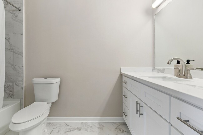 Building Photo - Beautifully Renovated Condo Style Apartment