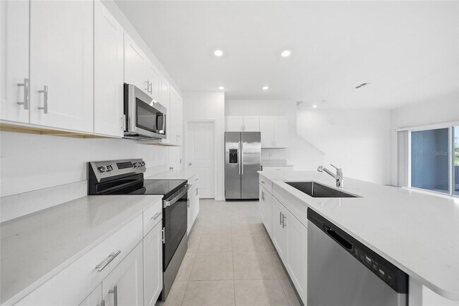 Building Photo - 8879 Coqui Song Ln