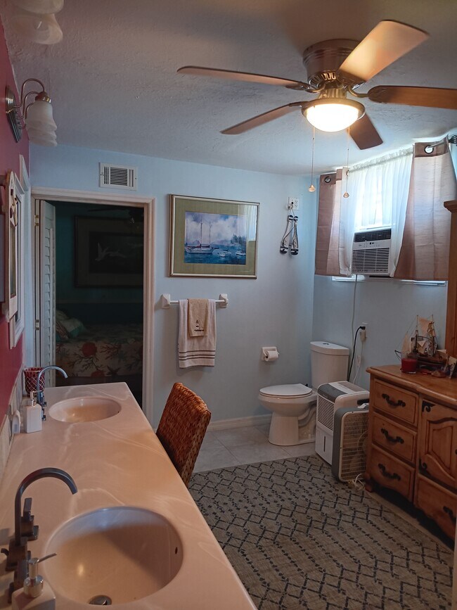 Bathroom with bedroom door open - 12890 Spencer St