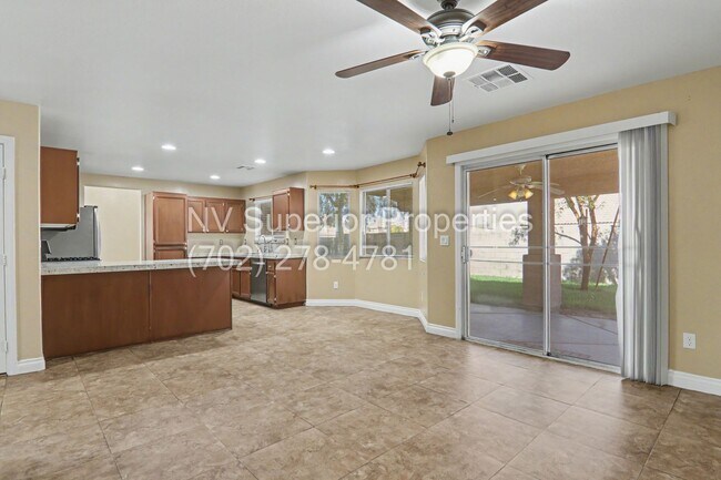 Building Photo - NW!! 4 bedrooms!! Bed & Bath DownStairs!!! RV Parking!!! Synthetic Grass Front yard!! Real Grass ...