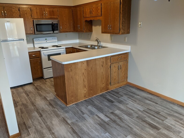 Kitchen (from dining area) - 7644 Woodlawn Dr