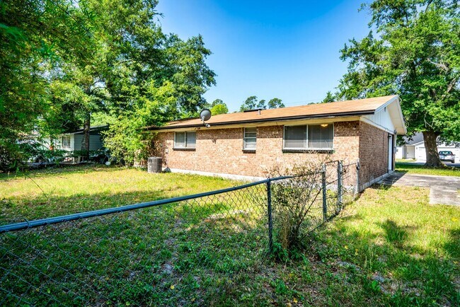 Building Photo - Timuquana 3BR/2BA Solid Brick Home w/ Flex Space & Private Yard