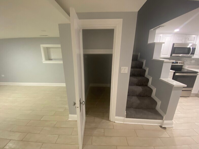 Front entrance with storage closet - 6079 N Albany Ave