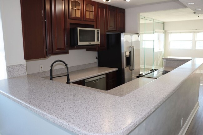 Building Photo - Luxurious Two-Story Condo with Breathtakin...