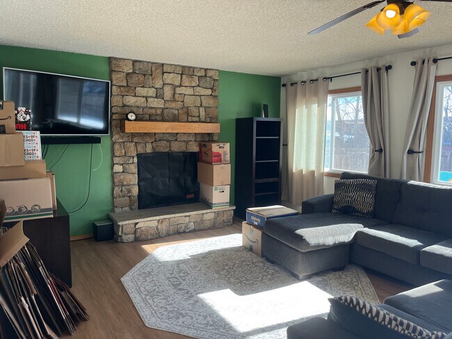 Sunken fireplace room with double windows - 2619 15th Ave