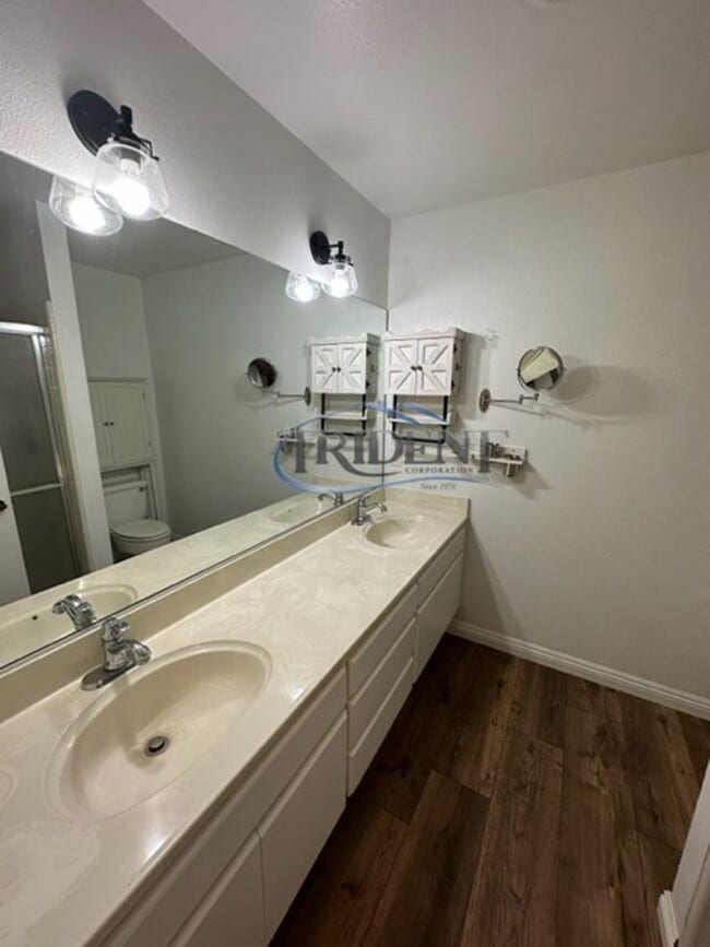 Building Photo - 3 bedroom, 2 ½ bath townhouse, located in The Grove gated community