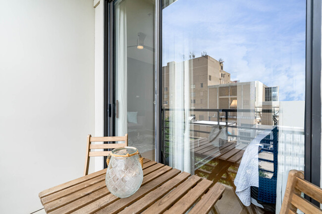 Your private balcony off of the bedroom. - 525 E 6th Street