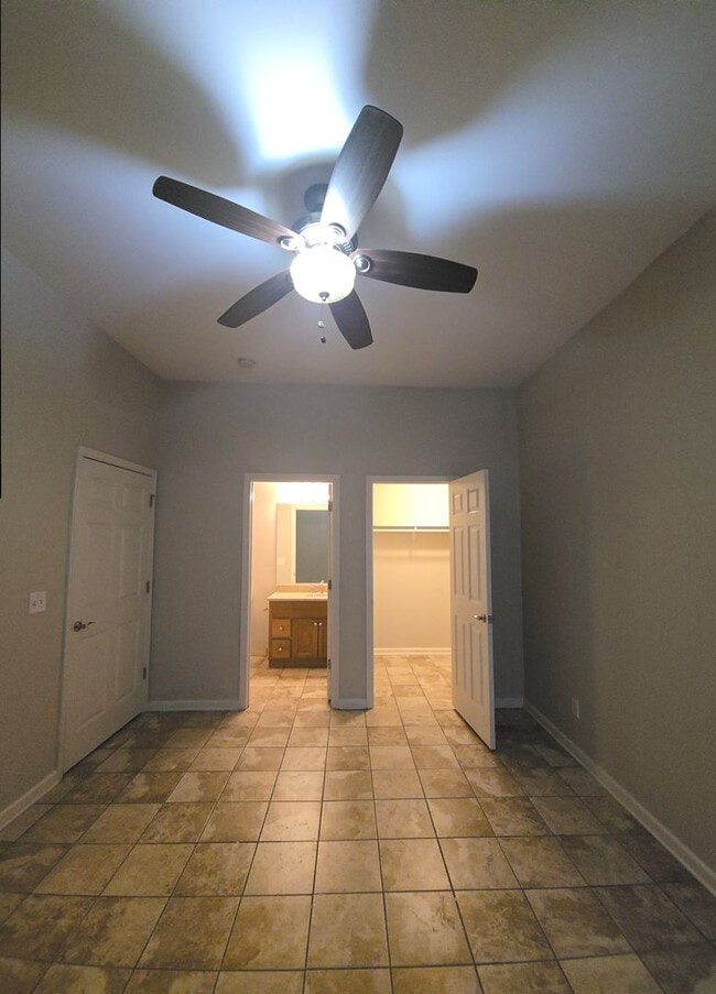 Building Photo - Sophisticated 2-Bedroom Retreat Featuring Soaring Ceilings & Modern Comforts