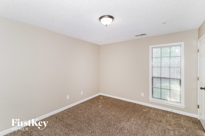 Building Photo - 7723 Ivy Mist Cove W