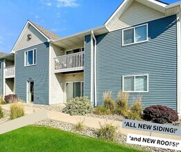 Building Photo - NEW EXTERIOR SIDING & ROOFS!! YOUR OWN IN ...