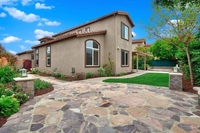 Building Photo - Gated corner lot home walking distance to the beach