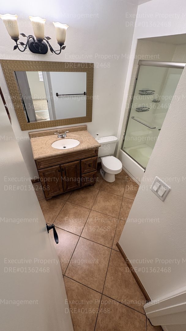 Building Photo - 3 bedroom 2 bathroom home on a corner lot with extra fenced parking.