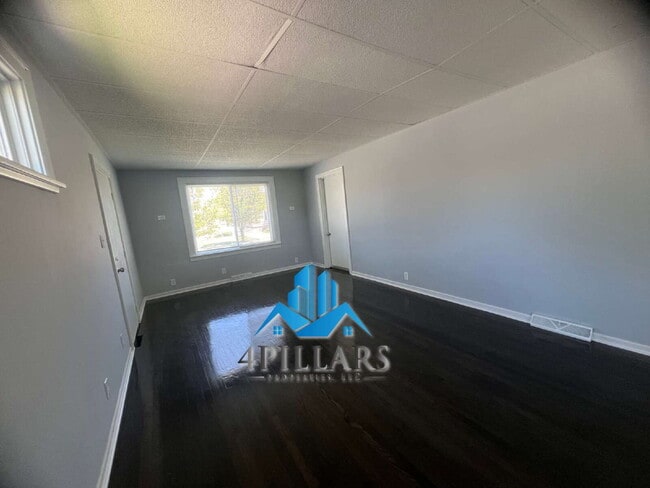Building Photo - "Charming 3-Bed Home with Partially Finished Basement & Gleaming Hardwood Floors in Hammond - 226...