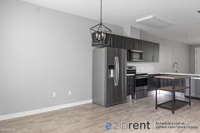 Building Photo - 2 br, 2.5 bath Townhome - 7805 Cooper Lane...