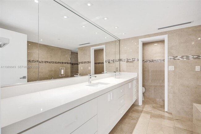 Building Photo - 10175 Collins Ave