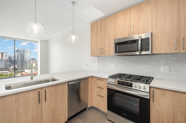 Building Photo - Luxury 1-Bedroom Condo in The Pullman – Do...