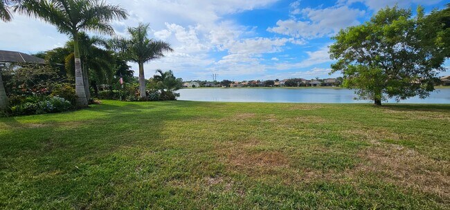 Building Photo - 4 Bedroom, 3 Bath Lakefront Home with 3-Ca...