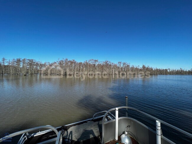 Building Photo - Beautiful lake views with this renovated 4 bedroom / 1.5 bath home with almost 1,379 sq feet of s...