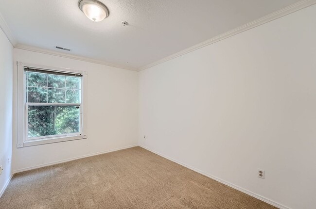 Building Photo - Ideally Located 3 Bed 3.5 Bath w/ Attached...