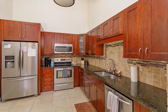 Building Photo - ? Charming Longwood Townhome with Modern U...
