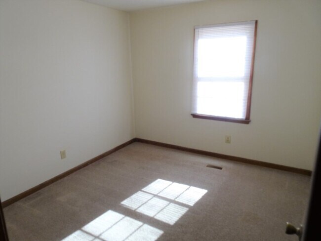 Building Photo - Great location, large wooded and fenced ya...