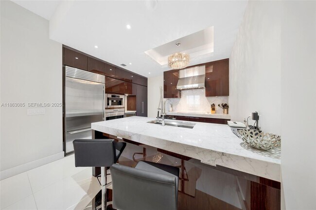 Building Photo - 9701 Collins Ave