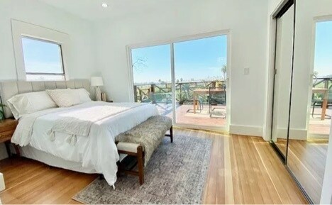 Master bedroom and sliding glass doors to deck. - 1334 Pennsylvania Ave