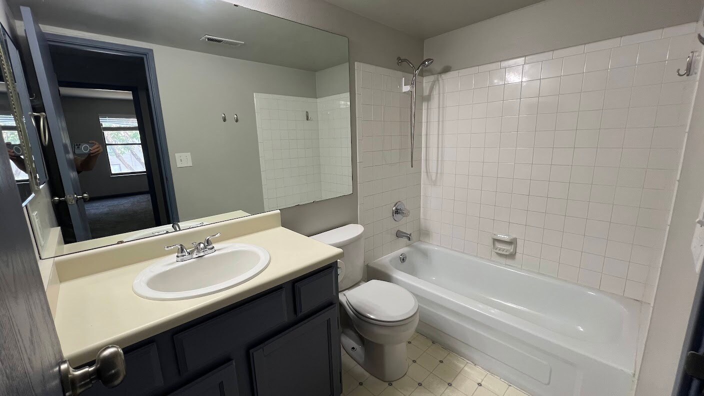 First full bathroom located across from Bedroom 1. - 12063 E Harvard Ave