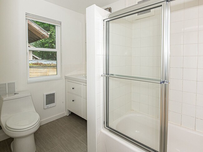 Building Photo - $300 off first month! Pristine 1-bdrm designer remodel. 1898 Kerns duplex with A/C, 1 block to 28th