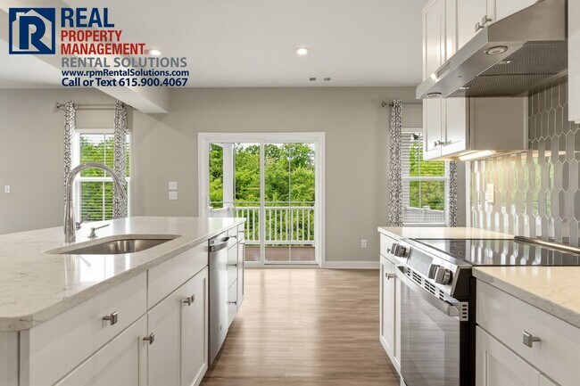 Building Photo - Great 4 bd 2.5 ba with attached garage and large deck!