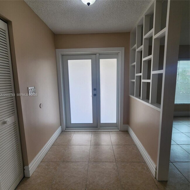 Building Photo - 11950 SW 49th Ct