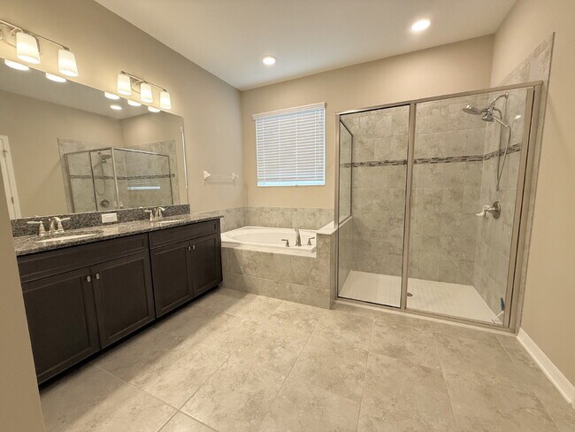 Building Photo - "Charming 3-Bed Oasis with 2 Full Baths in...