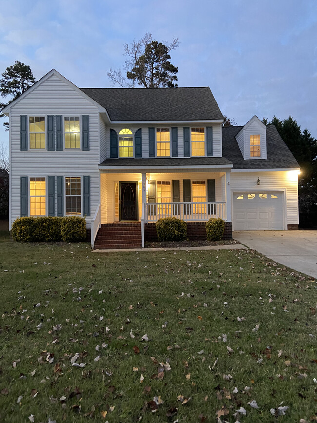 Twilight front view of house 2 - 1309 Ujamaa Dr