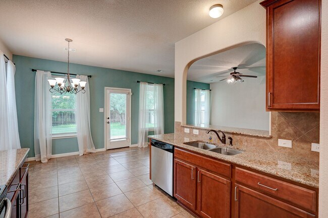 Building Photo - Bright & Roomy 4BR • 2.5BA • Two-Level Living