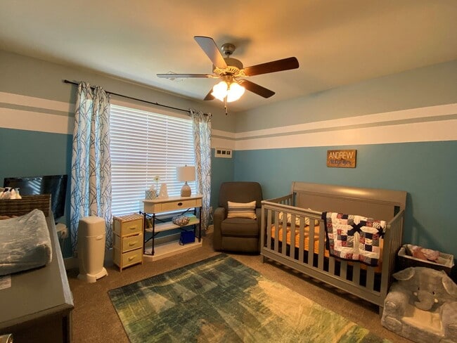 Building Photo - FENCED BACKYARD! BONUS ROOM/OFFICE! SAFE ROOM! THREE CAR GARAGE