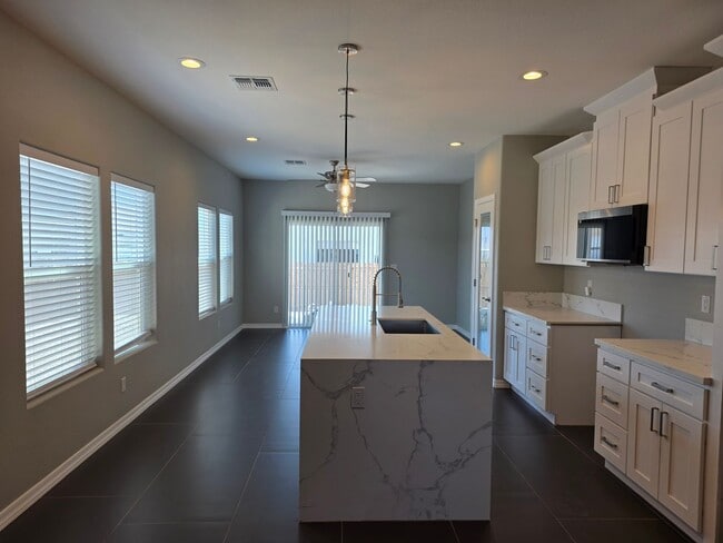 Building Photo - Beautiful new build-Never been lived in with pull through 3 car garage in Fort Mohave AZ
