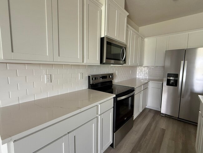 Building Photo - 12938 SW Forli Wy