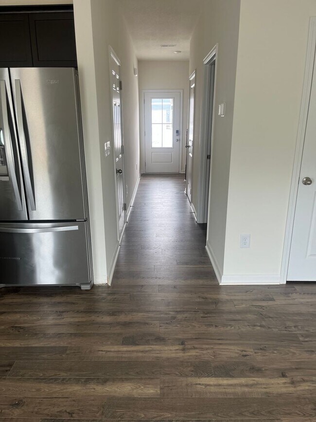 Building Photo - Brand New Townhome – Modern Comfort & Conv...