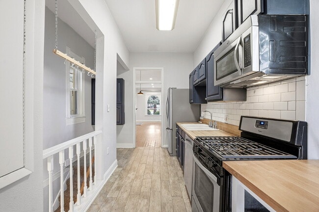 Building Photo - $2,640.95, 2-bed, 1-bath Victorian in the heart of Curtis Park with a detached garage.