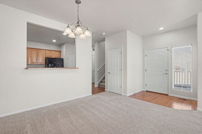 Building Photo - Beautifully Updated 3-Bedroom End-Unit Townhome Facing Open Space with Attached 2-Car Garage in G...