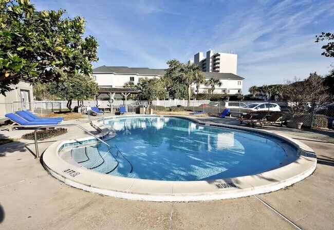 Building Photo - 50% off first months rent.  Gulf front com...